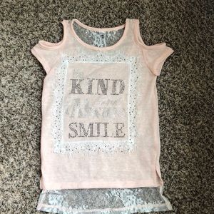 Very cute. Says be kind and always smile. Y-small
